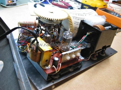 Figure 3 — Chassis internals — the drum gear drive, wiring, selenium rectifier, and transformer. Photo: radiomuseum.org.
