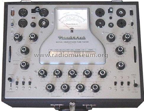 Figure 1 — The Heathkit TT-1 front panel: "MUTUAL CONDUCTANCE TUBE TESTER" across the top, the large illuminated meter, the built-in roll-chart window, and the bank of per-pin selector switches feeding the so…